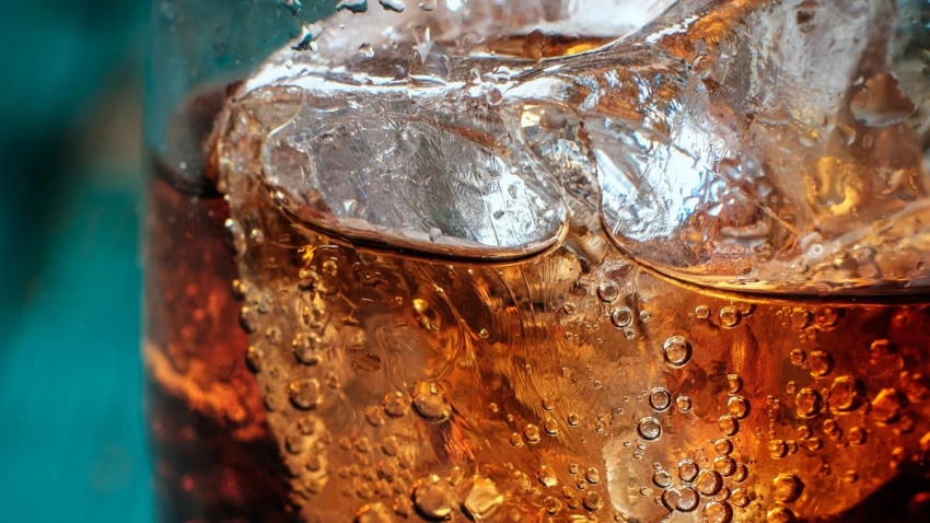 Article from www.nationalgeographic.com with the title Does Coca-Cola help migraines? The science behind this TikTok hack | National Geographic